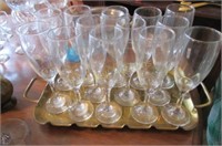 Brass tray with 12 champagne flutes