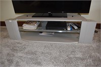 TV STAND 55" W - 14 1/2" H W/ GLASS SHELF CENTER