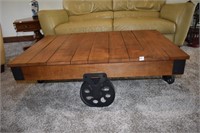 INDUSTRIAL TABLE WITH IRON WHEELS - 47" X 31" X