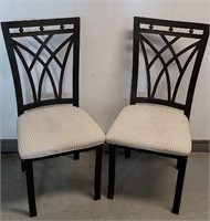 Pair of upholstered metal dining chairs