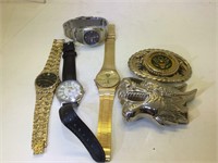 Lot of assorted watches and belt buckles - none