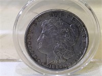 1886 Morgan Silver Dollar in plastic holder