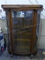 Antique curved glass display cabinet