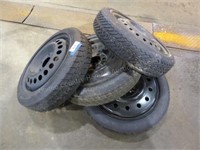 Four misc. space saver spare tires
