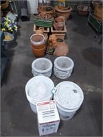 Row of terra cotta pots/planters & other