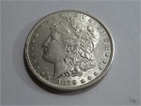 1879 O Better Date AU Grade Morgan Dollar