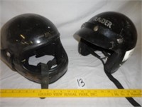 2 motor cycle helmets