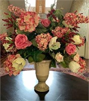 Beautiful faux floral arrangement in a ceramic