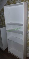 White laminate 4 shelf bookcase. 6 feet tall 12
