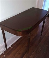 Antique mahogany D-shaped table.