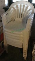 Stackable plastic chairs. Lot of eight white