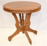 Antique round walnut East Lake Parlor Table