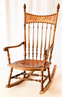 Oak Carved Back Armed Rocking Chair