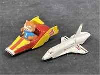 Pair of vintage rocket ship model toys
