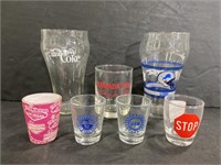 Collection of souvenir glass cups & shot glasses