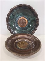 Two decorative metal art bowls