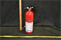 Filled fire extinguisher