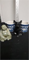 Buddha with tea cups and dog