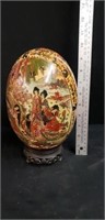 Large oriental egg with stand