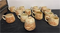Alaskan pottery 12 cups depicting aslask with