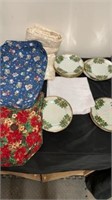 Group of Christmas plates with place mats