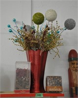 Glass vase with flower pics, etc.
