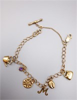 9 KT YELLOW GOLD CHAIN LINK BRACELET WITH CHARMS