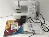 Kenmore sewing machine and sewing secrets book