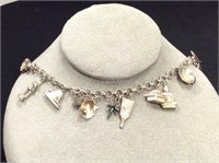 7 1/2" Charm Bracelet with Some Sterling Charms
