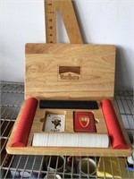 Poker chips and a Marboro wood box