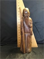 Monk carved in wood
