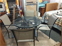 Wrought iron table W/ 4 chairs