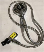 Showerhead on hose, not tested, sold as is