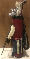 RED GOLF BAG WITH WILSON STAFF CLUBS