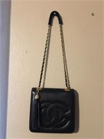 Chanel handbag looks very slightly used.