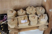 WOODEN ROLL TOY