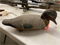 Duck decoy; maroon head, black bill