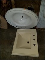 Two porcelain sinks