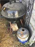 Charcoal grill on stand