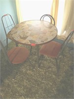 Round child’s table and chairs