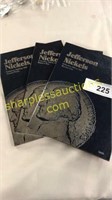 Three Jefferson nickel folders with coins