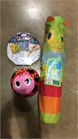 3 pc lot. Bells game, ladybug ball, sunny patch