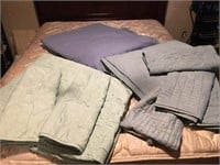 Three king size quilt style bedspreads with