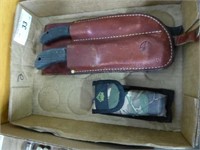 2 knives in sheaths