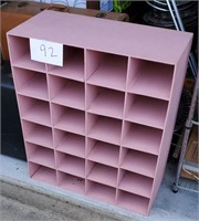 Pink Sectioned Shelving Unit