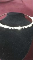 Silver coloured headband with rhinestones