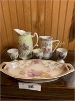 Small porcelain pitchers serving tray and more