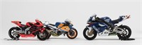 HONDA: Three Honda motorcycle models in various sc