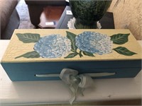 Blue wooden box with lotion