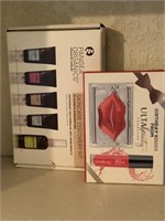 Lot of lipstick and skincare kit in box